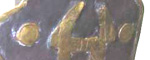 detail of cheek-piece rivets on real helmet